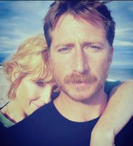 Kelly Reilly with her husband Kyle Baugher (image via Instagram/@mzkellyreilly)